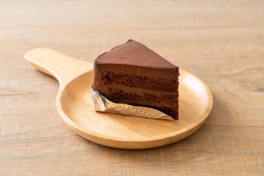 chocolate cake with soft chocolate layer on plate