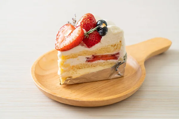 strawberry fresh cream cake - vanilla cake with fresh cream layer and fresh strawberry on top