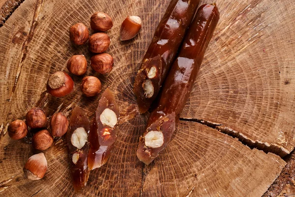 Churchkhela Composición Dulces Caseros Georgianos Nueces Sobre Fondo Madera — Foto de Stock