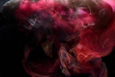 Kırmızı siyah pigment dönen mürekkep soyut arkaplan, suyun altında sıvı duman boyası