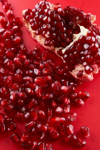 Ruby Ripe Fresh Juicy Sliced Pomegranate Isolated Red Background — Stock Photo, Image