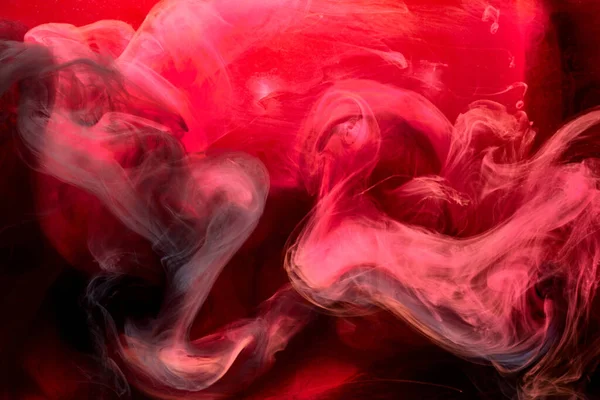 红黑色颜料旋转油墨抽象背景 液烟涂料水下 — 图库照片