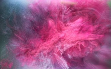Pembe duman mürekkep arka planı, renkli sis, soyut girdap dokunuşu okyanus denizi, akrilik boya pigmenti su altında.