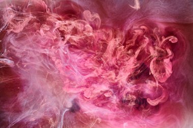 Pembe duman mürekkep arka planı, renkli sis, soyut girdap dokunuşu okyanus denizi, akrilik boya pigmenti su altında.