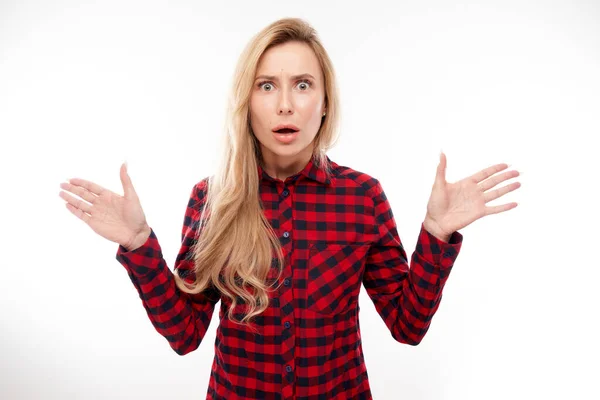 Shocked Blond Girl Looks Surprised Spreads Her Arms White Studio — Stock Photo, Image