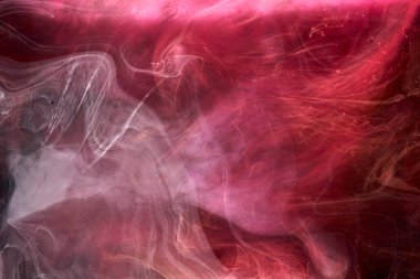 Siyah ve kırmızı mürekkep arka plan, renkli sis, soyut girdap okyanusu, akrilik boya pigmenti su altında, beyaz duman