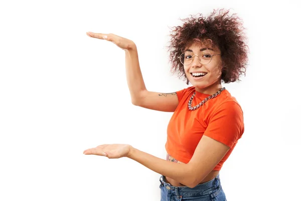 Attractive Curly Girl Promoter Holding Something Hand Demonstrating Empty Space — Stock Photo, Image