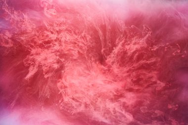 Pembe duman mürekkep arka planı, renkli sis, soyut girdap dokunuşu okyanus denizi, akrilik boya pigmenti su altında.