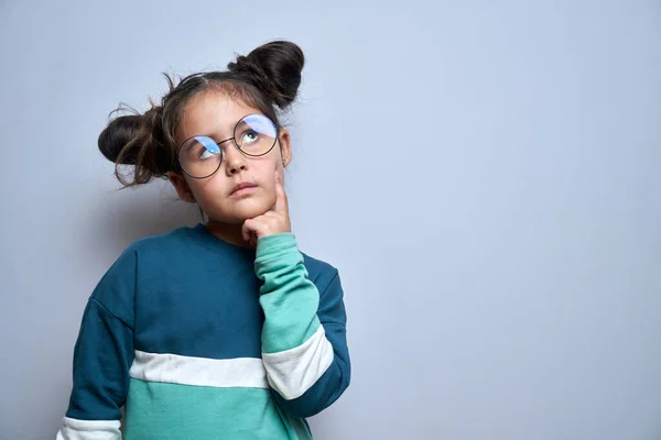 Funny Little Girl Glasses Holding Chin Doubts Makes Decision Isolated — 스톡 사진