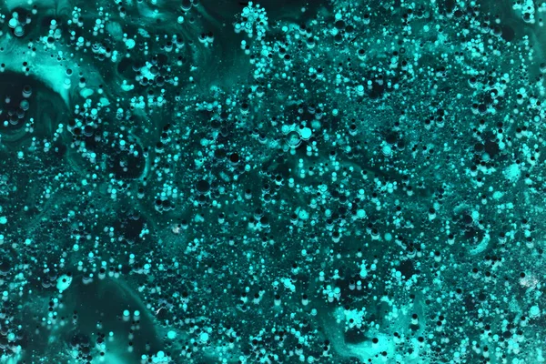 インク抽象的な背景 水中の泡のパターンをペイント 緑のアクリル顔料 — ストック写真