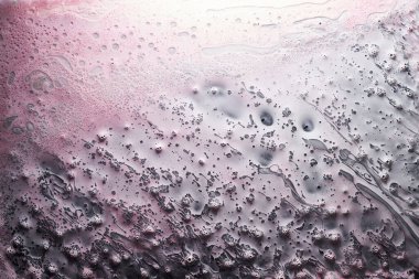 Mürekkep soyut arkaplan, su altında boya baloncukları deseni, açık pembe akrilik pigment