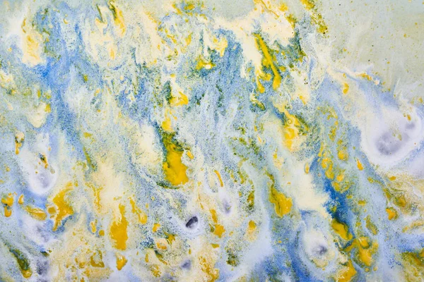 Ink abstract background, paint pattern under water, orange blue pigment acrylic stains, splashes and streaks