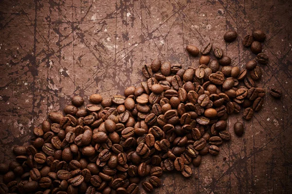 Roasted Coffee Beans Isolated Close Brown Grunge Background — Stock Photo, Image