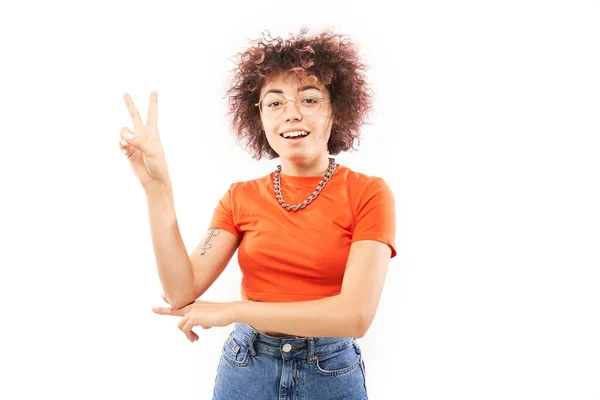 Positive Friendly Kazakh Girl Afro Hairstyle Shows Peace Love Gesture — Stock Photo, Image