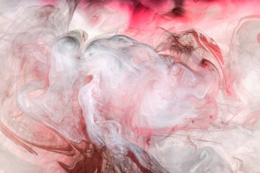 Sıvı akışkan sanat özgeçmişi. Pembe dans eden akrilik boyalar suyun altında, okyanus dumanı