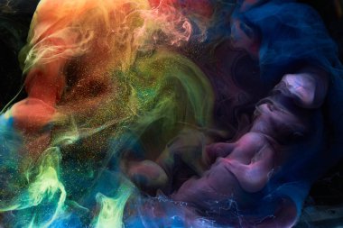 Sıvı akışkan sanat özgeçmişi. Su altında dans eden akrilik boya karışımı.