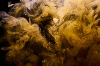 Sıvı akışkan sanat özgeçmişi. Ocher jetleri ve duman halkaları dans eden akrilik boyalar su altında, uzay okyanusu, renk patlaması