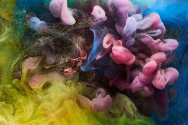 Sıvı akışkan sanat özgeçmişi. Su altında dans eden akrilik boya karışımı.