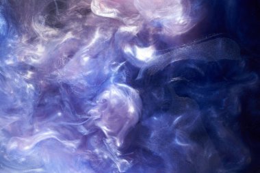 Sıvı akışkan sanat özgeçmişi. Mavi akrilik boya suyun altında, galaktik duman okyanusu