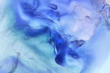 Sıvı akışkan sanat özgeçmişi. Mavi akrilik boya suyun altında, galaktik duman okyanusu