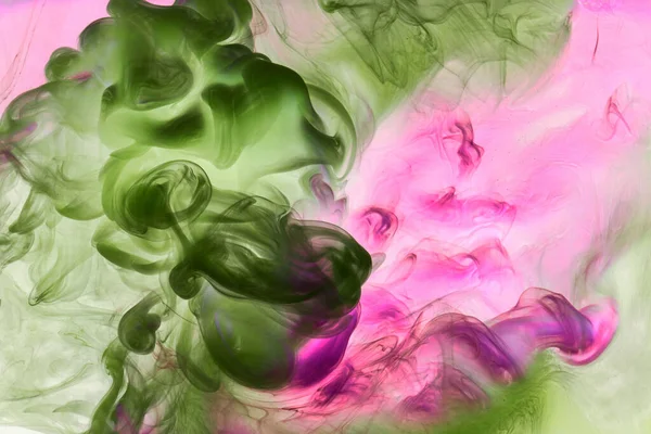 Yeşil mor duman soyut arka plan, su altında akrilik boya patlaması