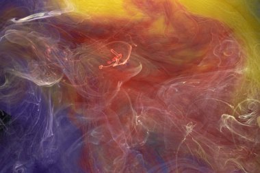 Çok renkli, koyu renkli, soyut bir arka plan, su altında akrilik boya patlaması.