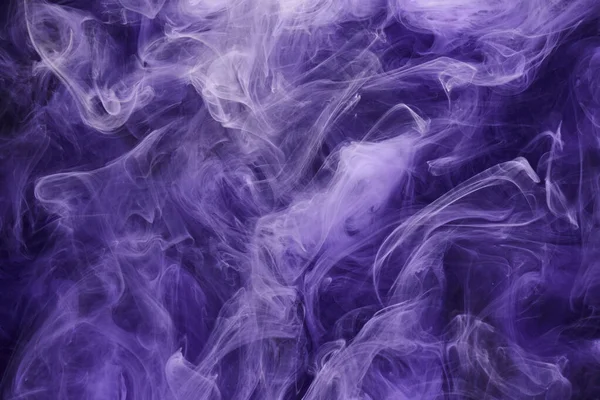 Purple lilac multicolored smoke abstract background, acrylic paint underwater explosion