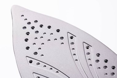 Demir yüzey, beyaz arkaplanda izole edildi.