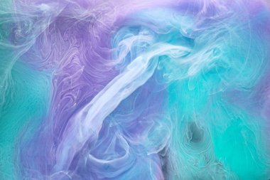 Mavi çok renkli duman soyut arka plan, su altında akrilik boya patlaması