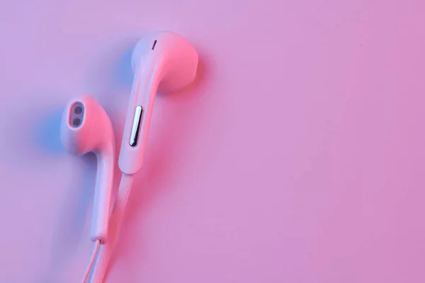 Wired White Earphones Isolated White Background Close Pink Neon Light — Stock Photo, Image
