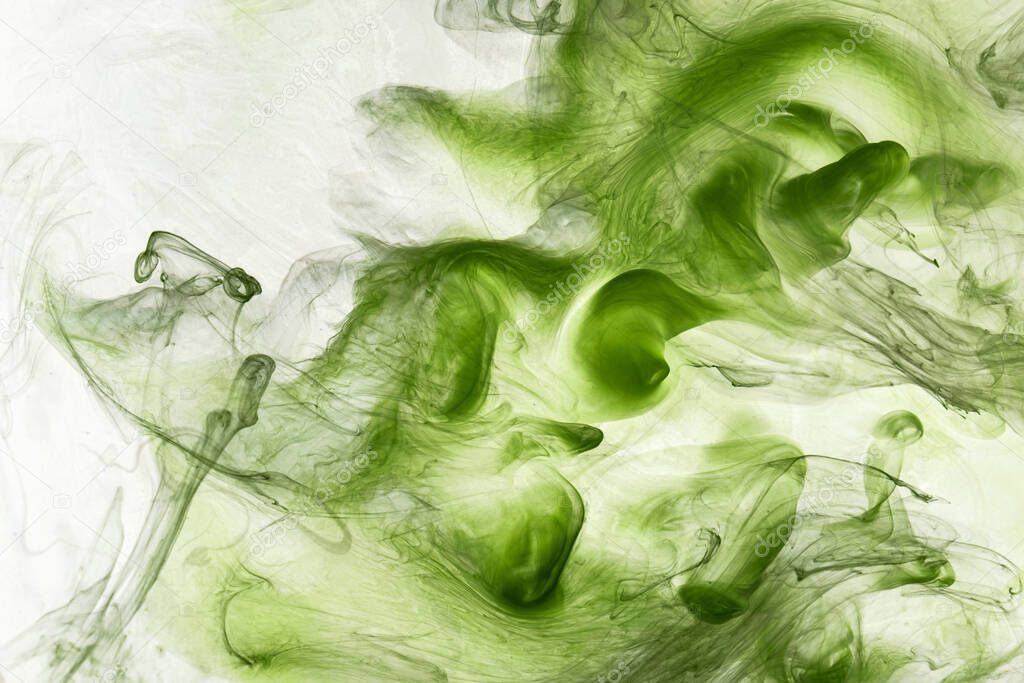 Green smoke abstract background, acrylic paint underwater explosion