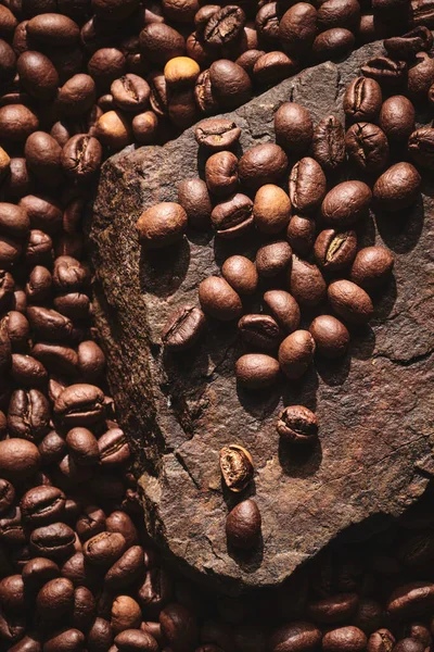 Roasted Coffee Beans Stone Pedestal Brown Background — Stock Photo, Image