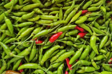 Close up of red and green chilli peppers for background.