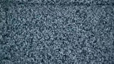 This Retro Television static was filmed using an old tube television set and a macro probe lens.