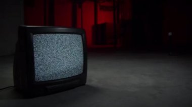 This Retro Television static was filmed using an old tube television set and a macro probe lens.