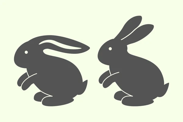 Zwei Tierische Hasensilhouetten Osterhase Silhouette Auf Weißem Hintergrund Vektorillustration — Stockvektor
