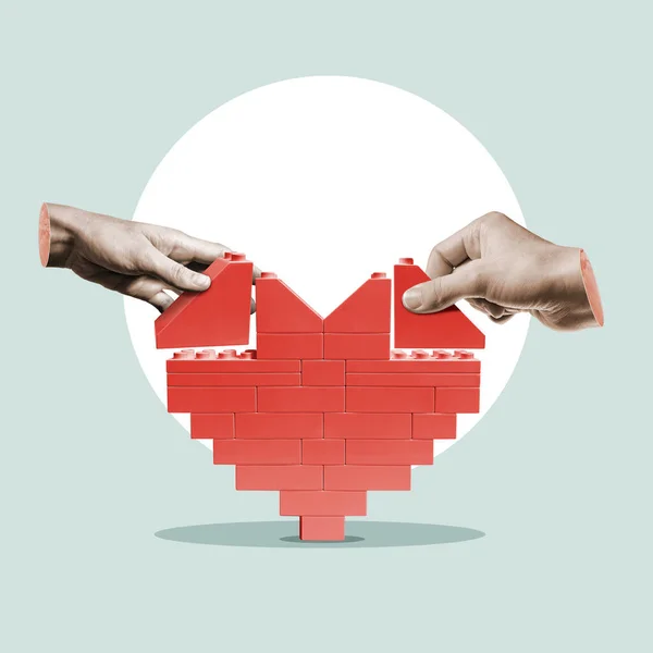 Two People Building Heart Constructor — Stockfoto