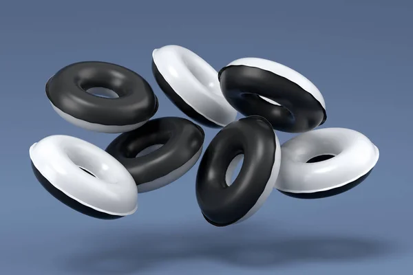 Цветные Надувные Кольца Летящие Черно Белом Фоне Визуализация Концепции Летних — стоковое фото