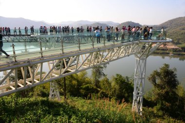 LOEi, THAILAND - 1 JANUARY 2022 : Tourists at Chiang Khan Skywalk, a new landmark of Chiang Khan, Loei Province, Thailand.