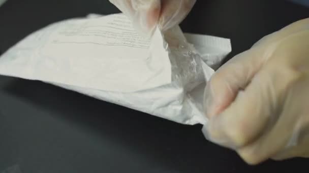Persons Hands Gloves Take Out White Paper Bag Parcel Wrapped — Video Stock