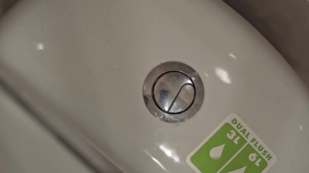 Hygiene Toilet Top View Mans Finger Presses Toilet Flush Button — Stock Video
