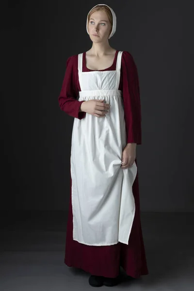 Regency Maid Servant Wearing Red Linen Dress Apron Cap Studio — Stock Photo, Image
