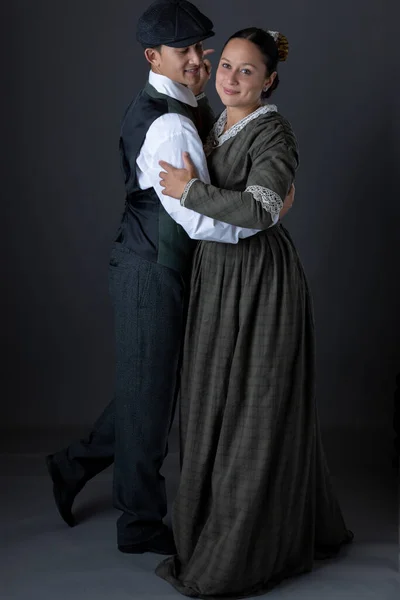 Romantic Working Class Victorian Couple Together Grey Studio Backdrop — Zdjęcie stockowe