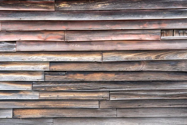 Köy ahşap kaplamalı harap bir arka plan..