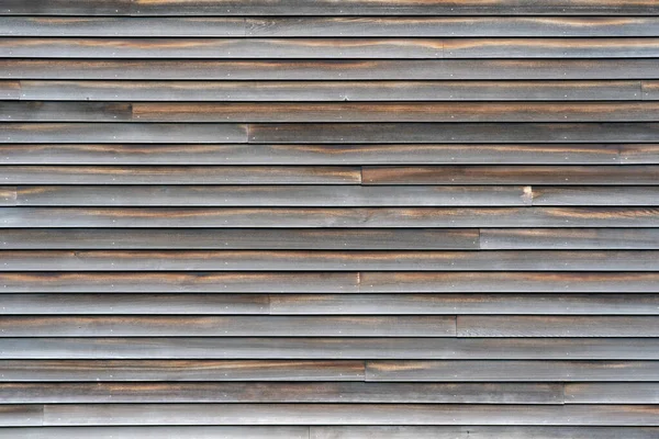 Background Weathered Wooden Siding Witht Nail Heads Showing — стоковое фото