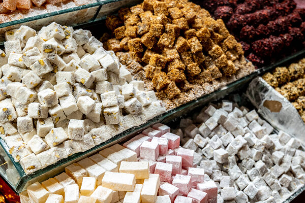 Turkish delight, Lokum in Turkey, assorted varieties of traditional Turkish sweets, close-up selected focus with bokeh