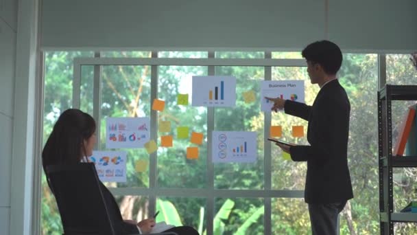 Businessman Presenting Report Chart Glass Board Team Mate Meeting — Stock Video