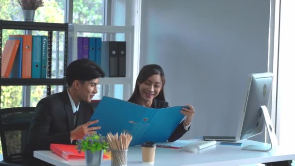 Young Asian Couple Having Fun Working Together Office — Wideo stockowe