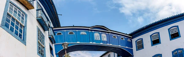 Icon of colonial architecture in Diamantina in the state of Minas Gerais, Gloria house with its suspended walkway connecting two historic houses