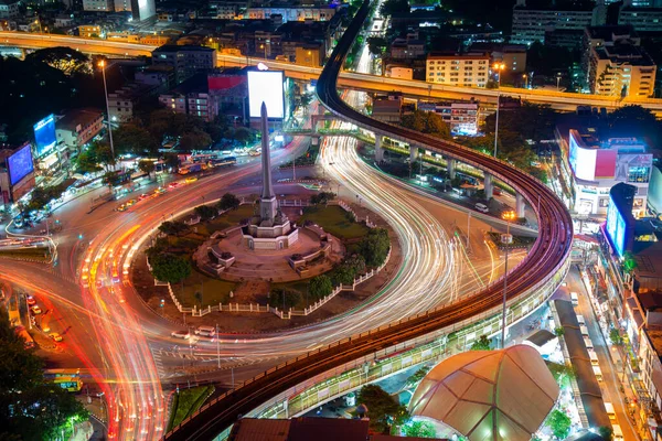 Thailand victory monument and main traffic for road in Bangkok, Thailand.Bangkok city night view with main traffic high way
